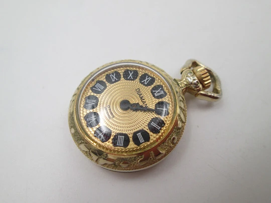 Diamant pendant watch. Gold plated. Manual wind. Vase with flowers enamel. 1970's