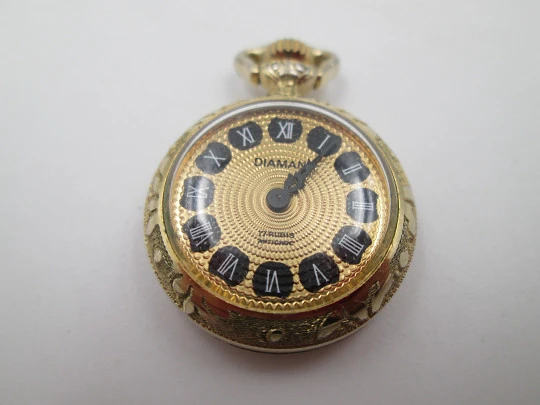 Diamant pendant watch. Gold plated. Manual wind. Vase with flowers enamel. 1970's