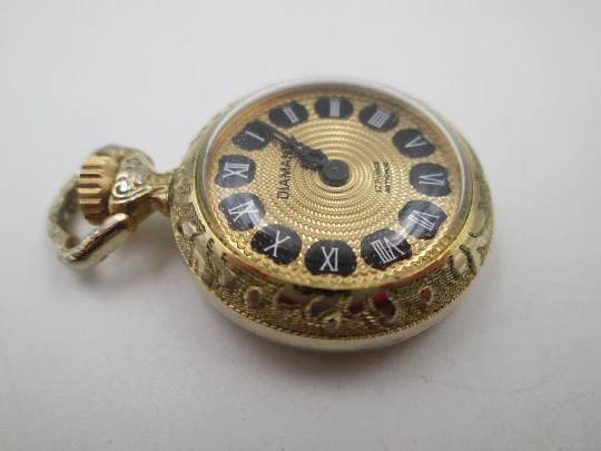 Diamant pendant watch. Gold plated. Manual wind. Vase with flowers enamel. 1970's