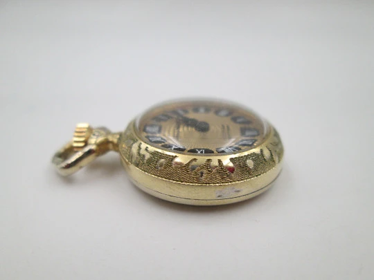 Diamant pendant watch. Gold plated. Manual wind. Vase with flowers enamel. 1970's