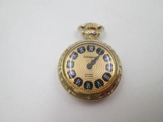 Diamant pendant watch. Gold plated. Manual wind. Vase with flowers enamel. 1970's Diamant pendant watch. Gold plated. Manual wind. Vase with flowers enamel. 1970's