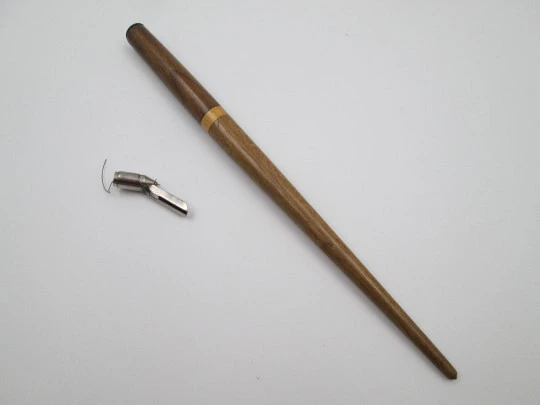 Dip calligraphy pen. Brown and cream wood. Silver plated metal nib. Europe. 1950's