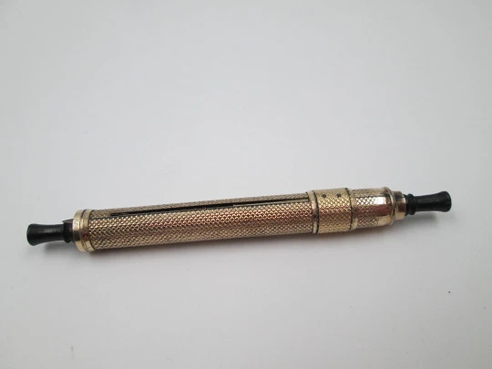 Dip calligraphy pen. Gold plated & hard rubber. Extendable end. Guilloche. Europe. 1900's