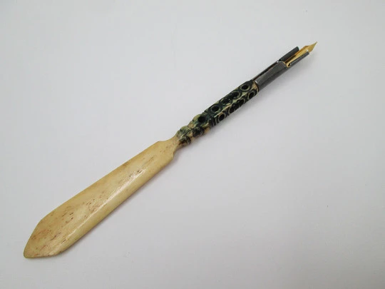 Dip calligraphy pen. Ivory and tinned metal. Geometric motifs. Europe. 1900