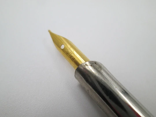 Dip calligraphy pen. Silver plated and ivory. Golden nib. Europe. 1900's Dip calligraphy pen. Silver plated and ivory. Golden nib. Europe. 1900's