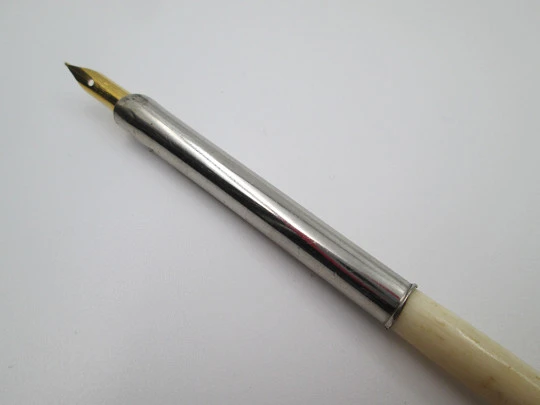 Dip calligraphy pen. Silver plated and ivory. Golden nib. Europe. 1900's