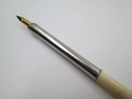 Dip calligraphy pen. Silver plated and ivory. Golden nib. Europe. 1900's Dip calligraphy pen. Silver plated and ivory. Golden nib. Europe. 1900's