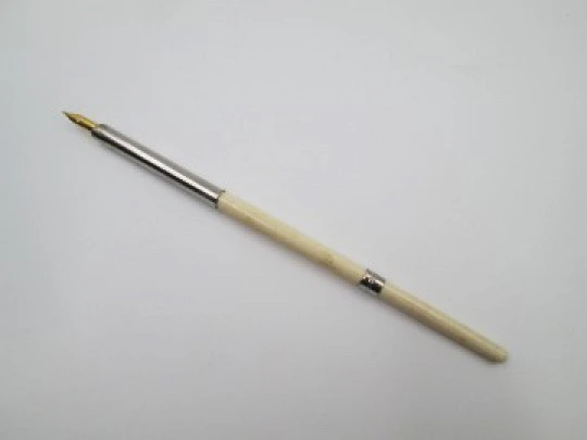 Dip calligraphy pen. Silver plated and ivory. Golden nib. Europe. 1900's Dip calligraphy pen. Silver plated and ivory. Golden nib. Europe. 1900's