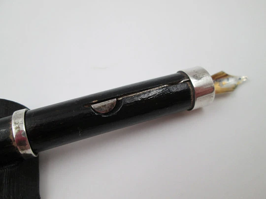 Dip calligraphy pen. Sterling silver and black wood. Gold plated nib. 1953