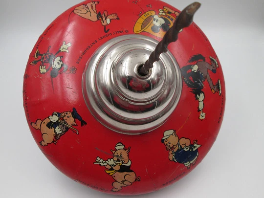 Disney Enterprises toy spinning top. Lithographed tinplate. Seven characters. 1930