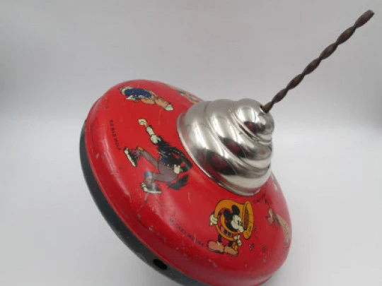 Disney Enterprises toy spinning top. Lithographed tinplate. Seven characters. 1930