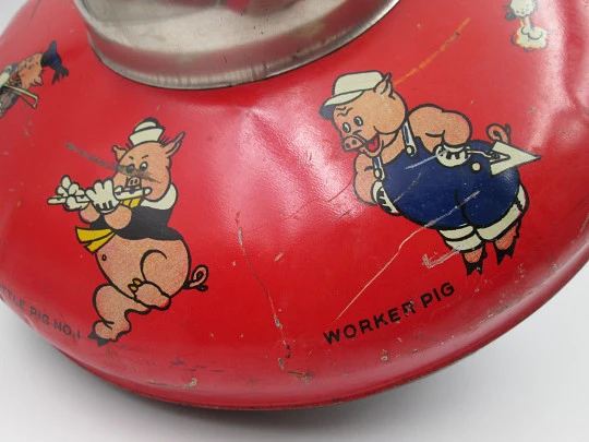 Disney Enterprises toy spinning top. Lithographed tinplate. Seven characters. 1930