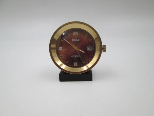 DKLB desk travel clock. Bronze. Wind-up. Calendar. Purple dial. Europe. 1970's