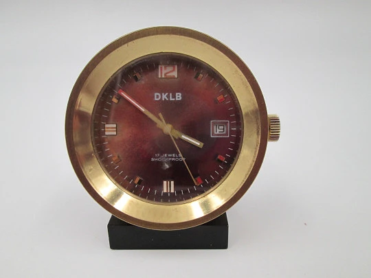 DKLB desk travel clock. Bronze. Wind-up. Calendar. Purple dial. Europe. 1970's