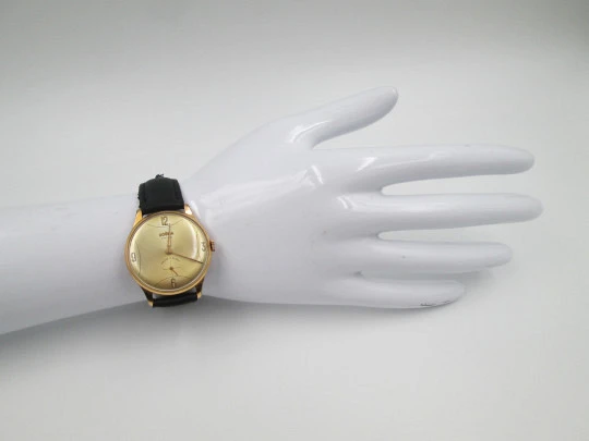 Dogma Prima. 10 microns gold plated & stainless steel. Manual wind. Swiss. 1950's