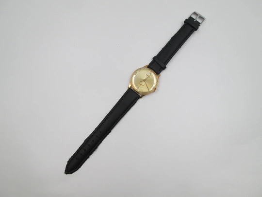 Dogma Prima. 10 microns gold plated & stainless steel. Manual wind. Swiss. 1950's