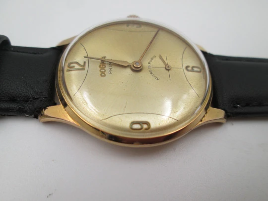 Dogma Prima. 10 microns gold plated & stainless steel. Manual wind. Swiss. 1950's