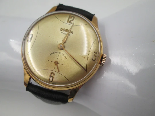 Dogma Prima. 10 microns gold plated & stainless steel. Manual wind. Swiss. 1950's