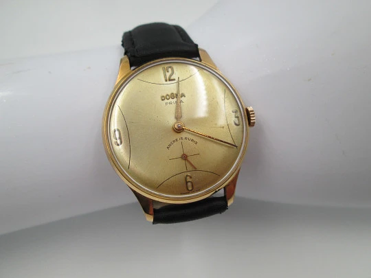 Dogma Prima. Chapado oro 10 micras y acero. Cuerda manual. Segundero. Suiza. 1950