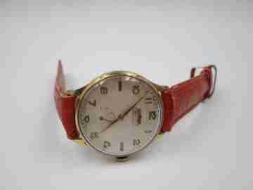 Dogma Prima. Gold plated & stainless steel. 1950's. Manual wind. Strap