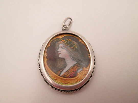 Double-sided picture frame pendant. Sterling silver. Cord motif edge. 1980's