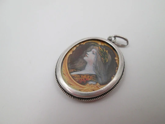 Double-sided picture frame pendant. Sterling silver. Cord motif edge. 1980's