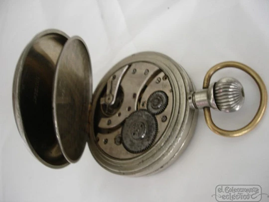 Doxa. Silver metal. 1930's. Lepine. Remontoir. Swiss. Porcelain dial