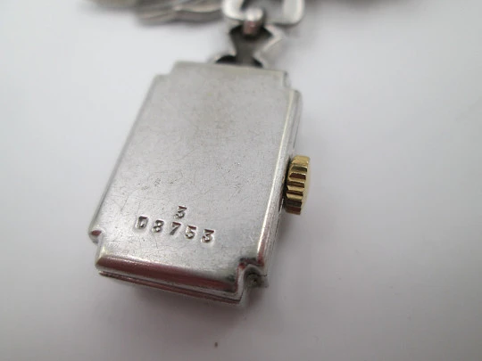 Dulux women's pendant watch. Rhodium plated metal. Sterling silver brooch. 1940's