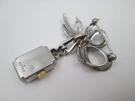 Dulux women's pendant watch. Rhodium plated metal. Sterling silver brooch. 1940's