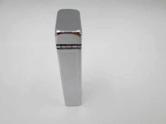 Dunhill Rollalite petrol pocket lighter. Silver laminated. Rhomboid pattern. Swiss. 1950's Dunhill Rollalite petrol pocket lighter. Silver laminated. Rhomboid pattern. Swiss. 1950's