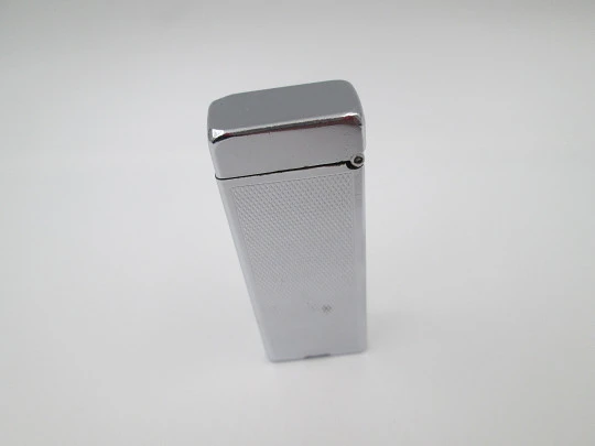 Dunhill Rollalite petrol pocket lighter. Silver laminated. Rhomboid pattern. Swiss. 1950's Dunhill Rollalite petrol pocket lighter. Silver laminated. Rhomboid pattern. Swiss. 1950's