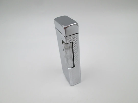 Dunhill Rollalite petrol pocket lighter. Silver laminated. Rhomboid pattern. Swiss. 1950's Dunhill Rollalite petrol pocket lighter. Silver laminated. Rhomboid pattern. Swiss. 1950's