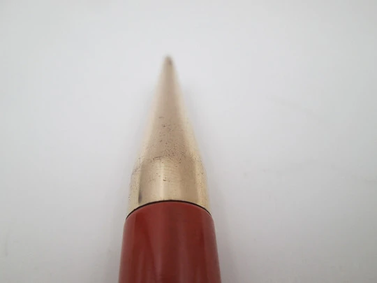 Dunlop Fort mechanical pencil. Orange celluloid & gold plated. England. 1920's