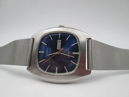 Duward Diplomatic. Acero. Automático. Día y fecha. Esfera azul. Estuche. 1970