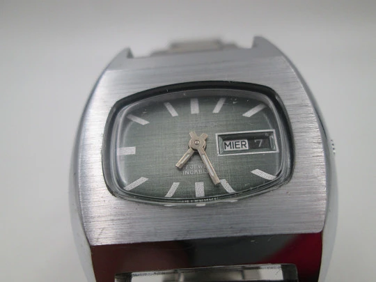 Duward Internat reloj unisex. Acero y metal niquelado. Dial verde. Brazalete. Cuerda