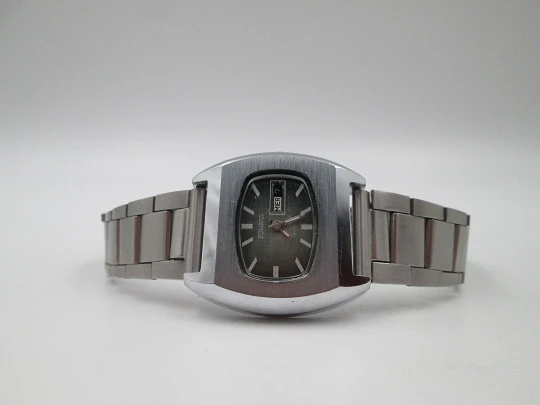 Duward Internat reloj unisex. Acero y metal niquelado. Dial verde. Brazalete. Cuerda