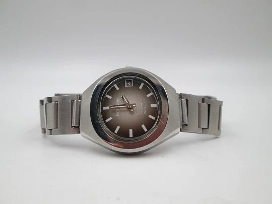 Duward Internat women's watch. Steel. Iridiscent dial. Calendar. Manual wind