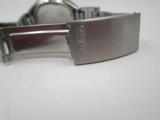 Duward Internat women's watch. Steel. Iridiscent dial. Calendar. Manual wind