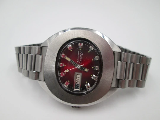 Duward Internat. Automatic. 1970's. Stainless steel. Calendar. Red dial