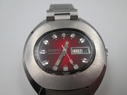 Duward Internat. Automatic. 1970's. Stainless steel. Calendar. Red dial