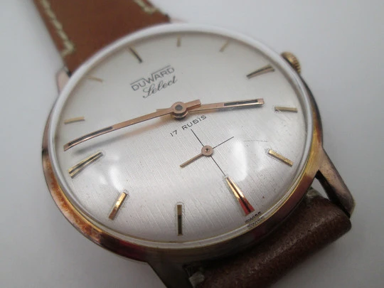 Duward Select. Steel & 10 microns gold plated. Manual wind. Small seconds hand. 1970's