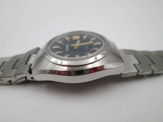 Duward Triumph mujer. Acero inoxidable. Cuerda manual. Calendario. Brazalete. 1970