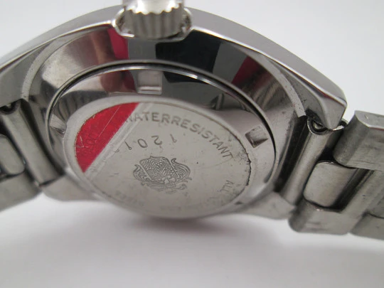 Duward Triumph mujer. Acero inoxidable. Cuerda manual. Calendario. Brazalete. 1970