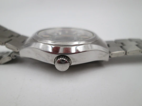 Duward Triumph mujer. Acero. Cuerda manual. Calendario. Brazalete. Esfera verde. 1970