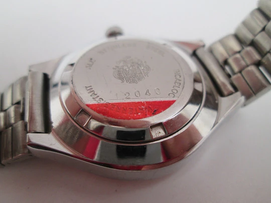 Duward Triumph mujer. Acero. Cuerda manual. Calendario. Brazalete. Esfera verde. 1970