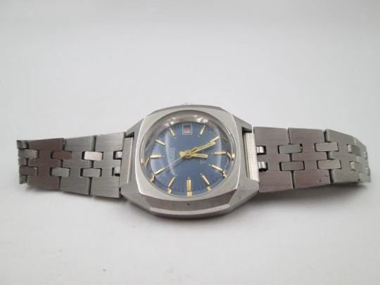Duward Triumph mujer. Cuerda manual. Acero inoxidable. Dial azul. Brazalete. Calendario
