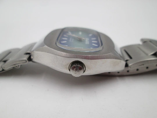 Duward women's watch. Stainless steel. Bitone dial. Calendar. Manual wind. Bracelet. 1970's