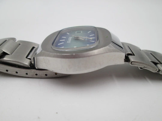 Duward women's watch. Stainless steel. Bitone dial. Calendar. Manual wind. Bracelet. 1970's