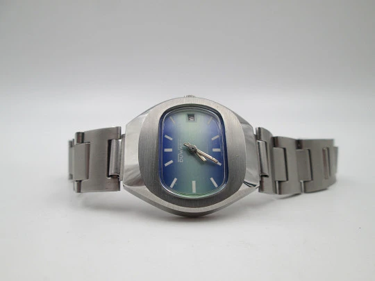 Duward women's watch. Stainless steel. Bitone dial. Calendar. Manual wind. Bracelet. 1970's