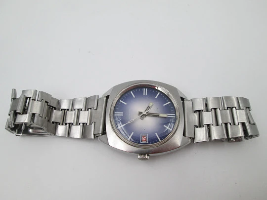 Duward. Acero inoxidable. Dial tornasolado azul gris. Calendario. Brazalete. 1970